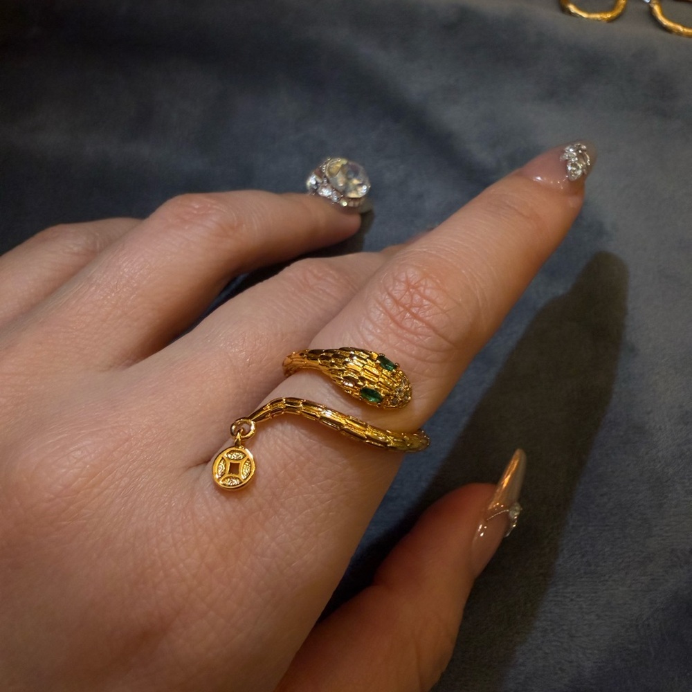 Sold! Adjustable Golden Snake Ring with Green Gemstone